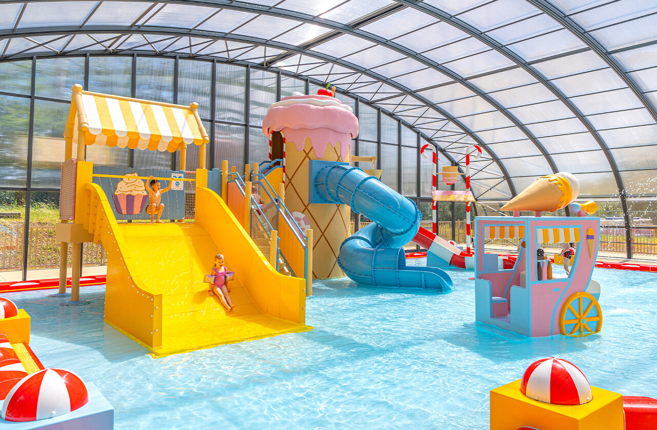 Covered pool, slides, water games at CAPFUN Palais de Gaufrette.