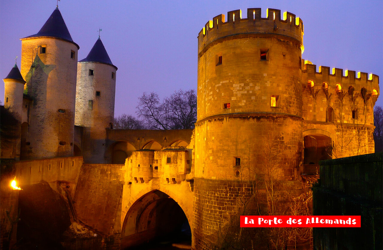 Illuminated Porte des Allemands in Metz, historic monument to visit in Lorraine.