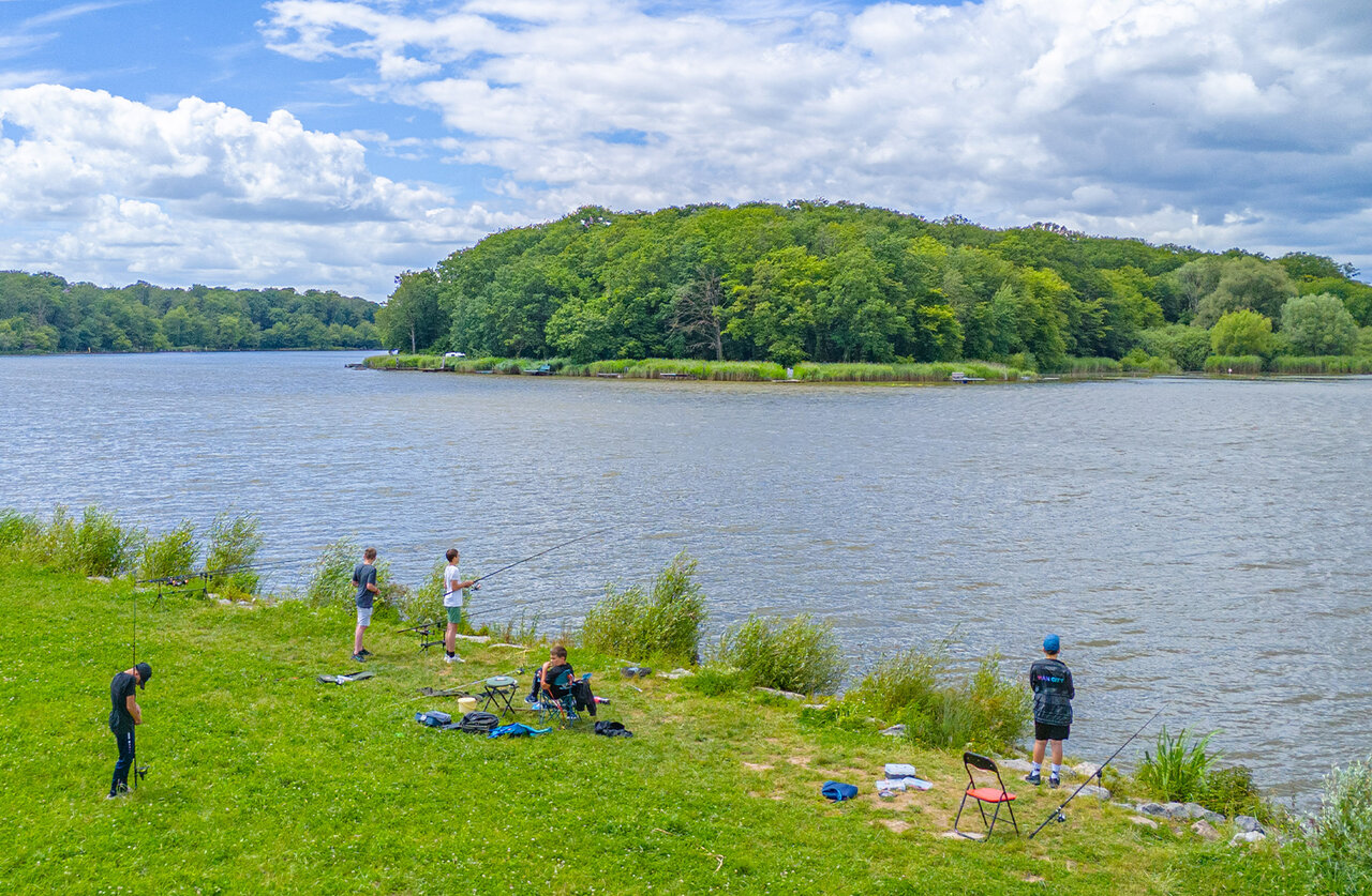 Fishermen by the lake at CAPFUN Palais de Gaufrette campsite in R�mering les Puttelange (57).