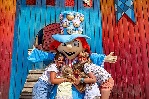 Mascot and happy children with face paint at CAPFUN Palombi�re, SAINT-NATHALENE (24).