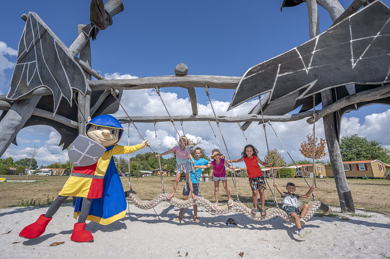 Playground, children and mascot, CAPFUN Paradis de Bazas in BAZAS (33).