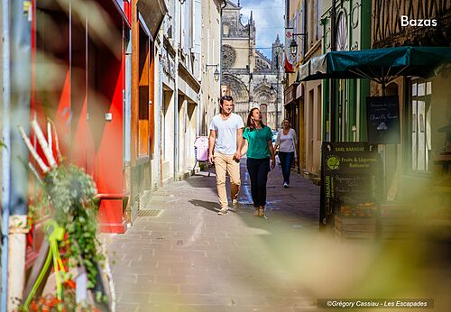 Historic street in Bazas with cathedral, a place to visit in Gironde.