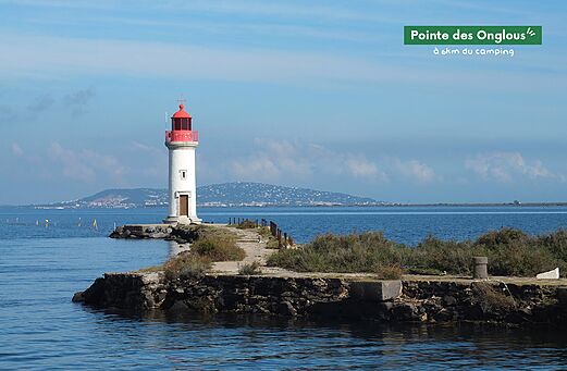 Lighthouse at Pointe des Onglous, tourist attraction near Marseillan-Plage (34).