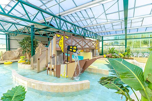 Pirate ship water play area in indoor pool CAPFUN Parc de Paris.