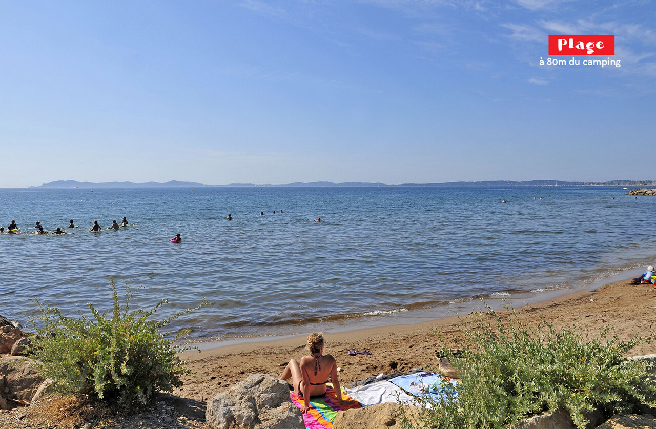 Fine sandy beach, swimming in the sea at CAPFUN Parc et Plage camping.