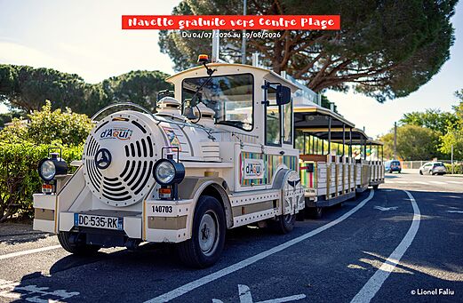 Shuttle tourist train beach at CAPFUN Paris Roussillon campsite in ARGELES SUR MER.