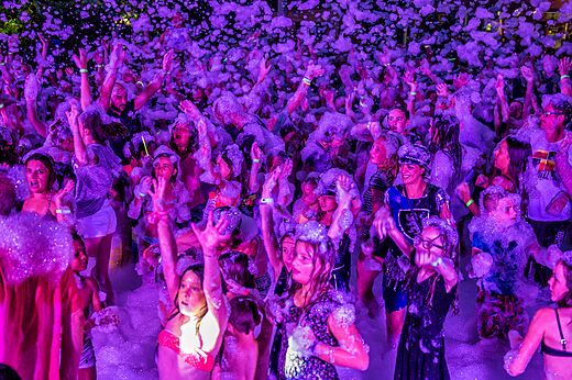 Festive foam party at CAPFUN Paris Roussillon campsite in ARGELES SUR MER.