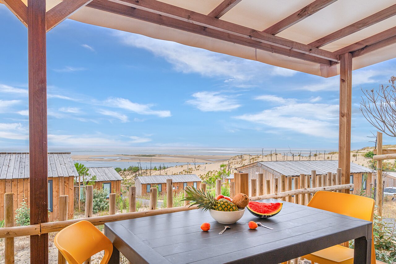 Mobile home with terrace, sea and dunes view, at CLICOCHIC Petit Nice campsite, PYLA SUR MER (33).