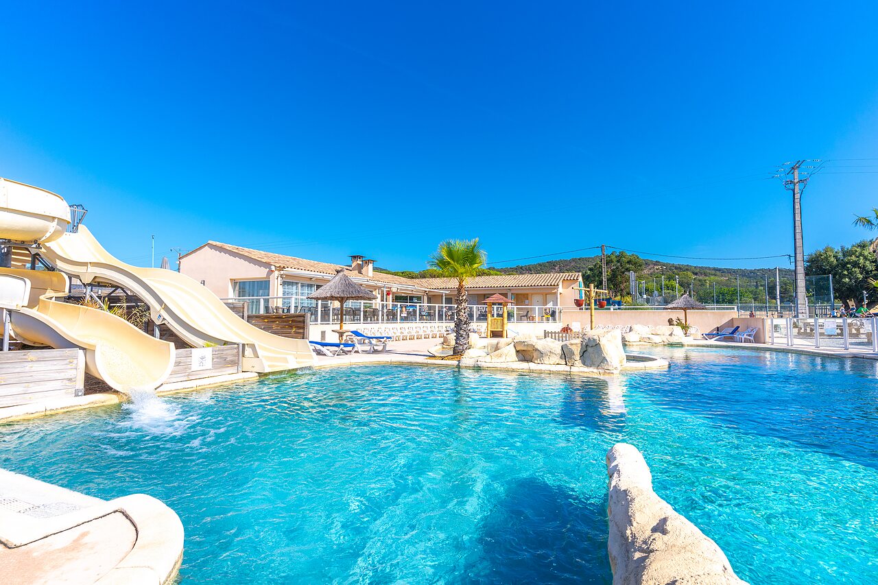 Water slides and large outdoor pool at CAPFUN La Pin�de de Grimaud campsite in Grimaud (83).
