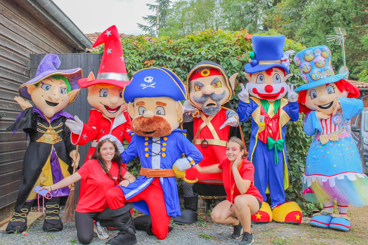 Colorful mascots and smiling animators for entertainment at CAPFUN Les Portes du Beaujolais campsite.