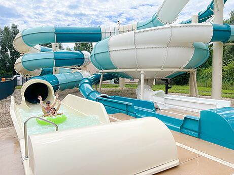 Giant water slides and pool at CAPFUN Les Portes du Beaujolais Anse (69).