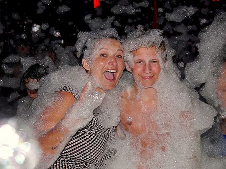 Foam party, campers at CAPFUN Les Portes du Beaujolais campsite in Anse.