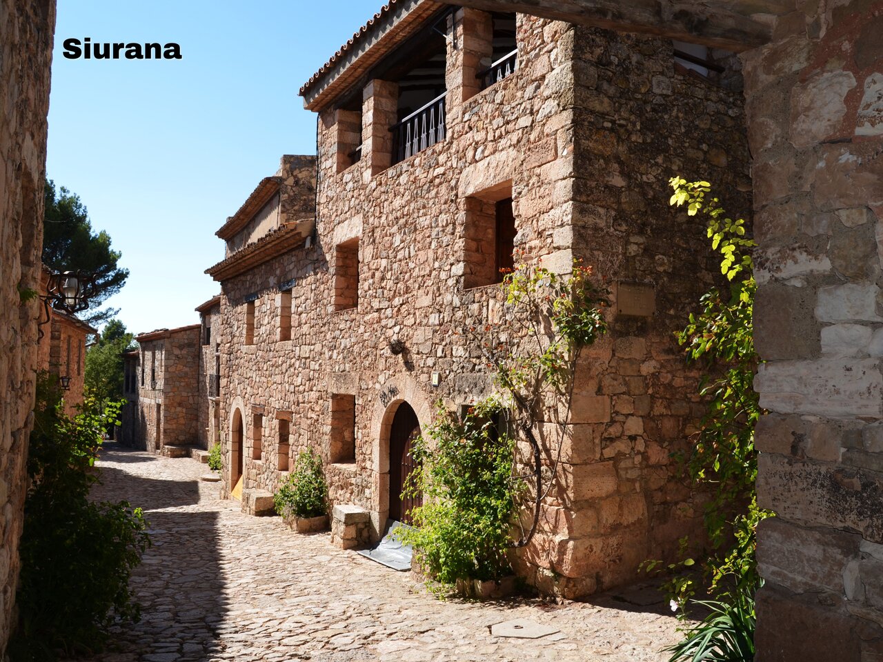 Medieval village of Siurana with cobbled streets and stone houses, worth visiting.