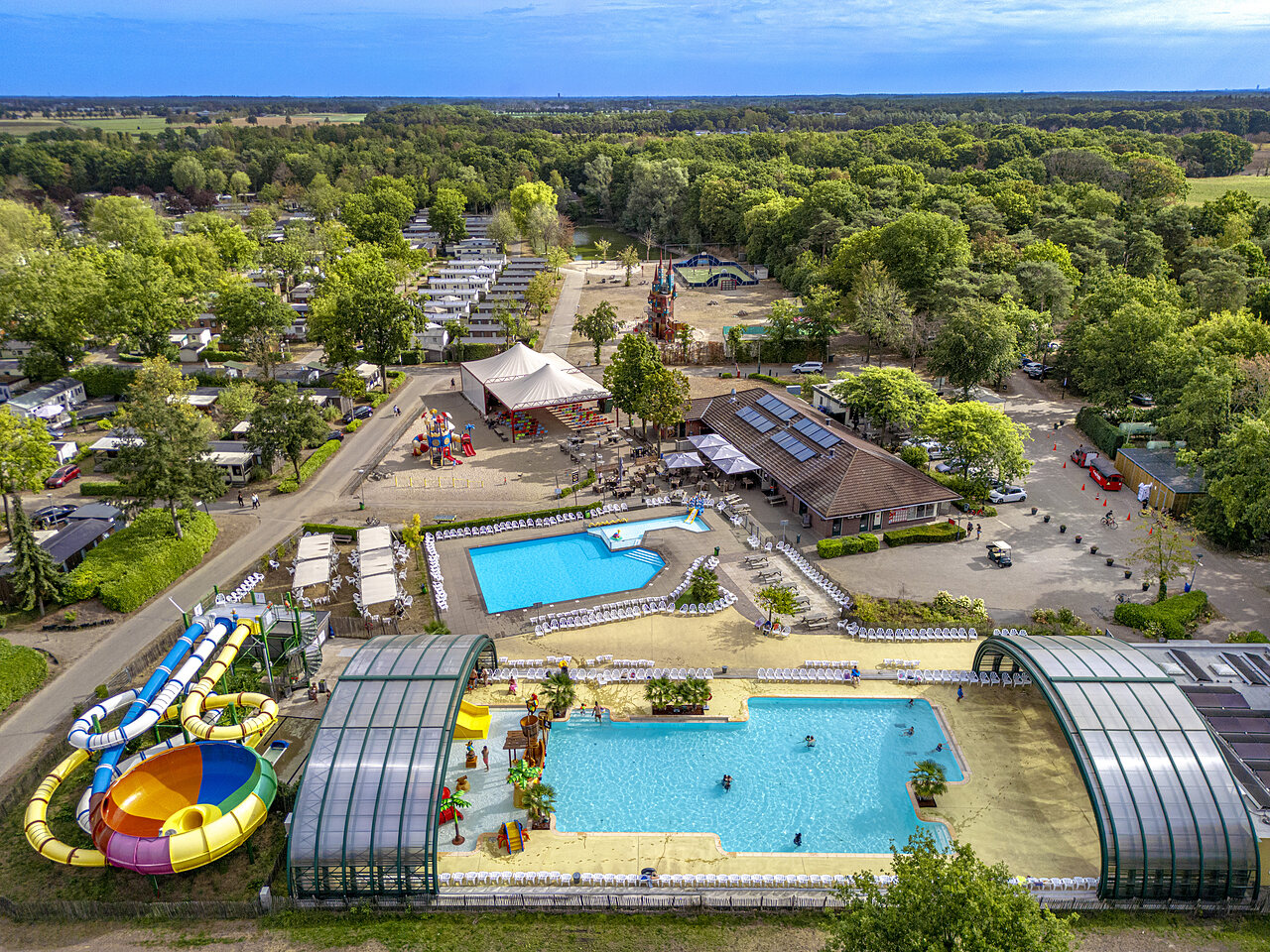 Swimming pools, water slides, playgrounds, Mobil-homes at CAPFUN Rakelbos campsite in Westelbeers.