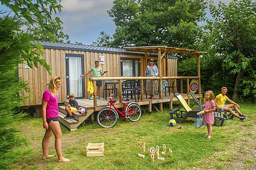 Modern mobile home, family and games at CAPFUN Roumingue campsite in LANTON.