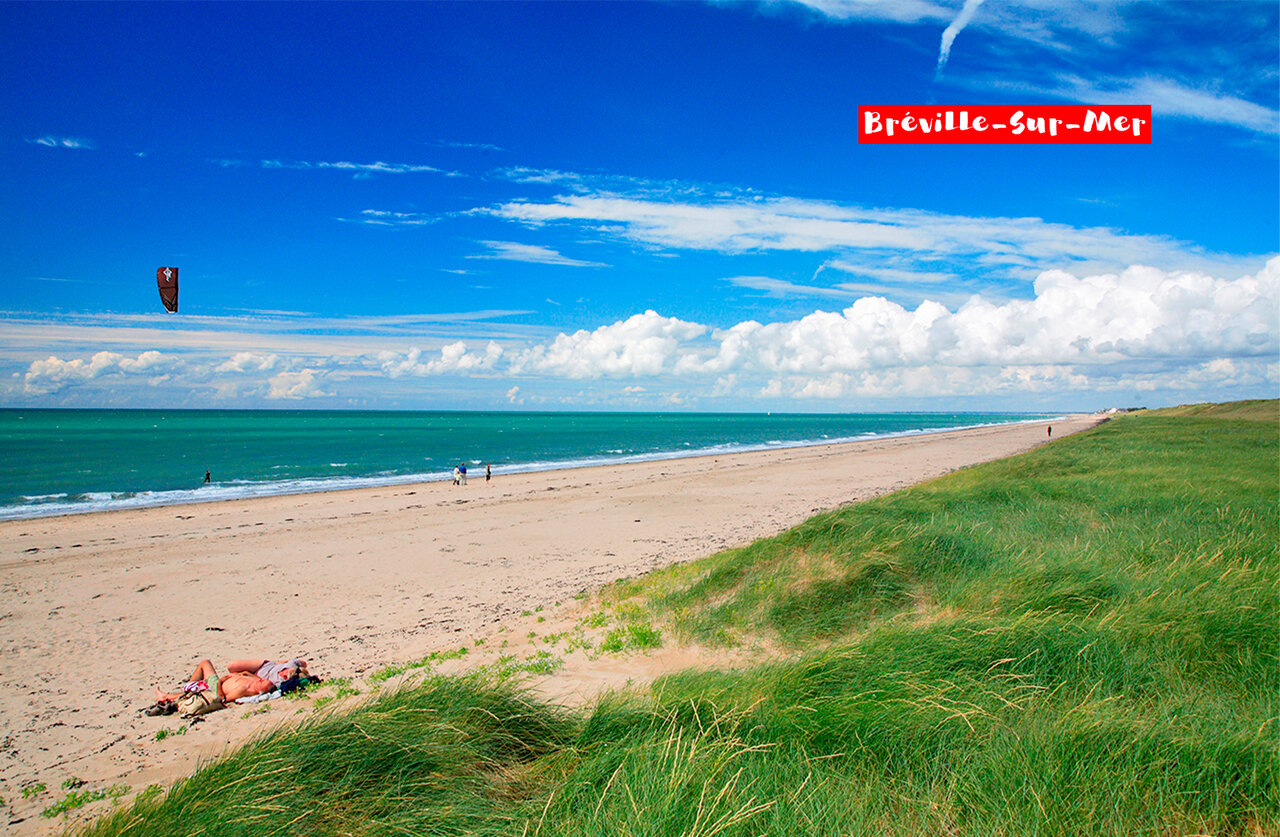 Fine sandy beach and turquoise sea in Br�ville-sur-Mer, Normandy.