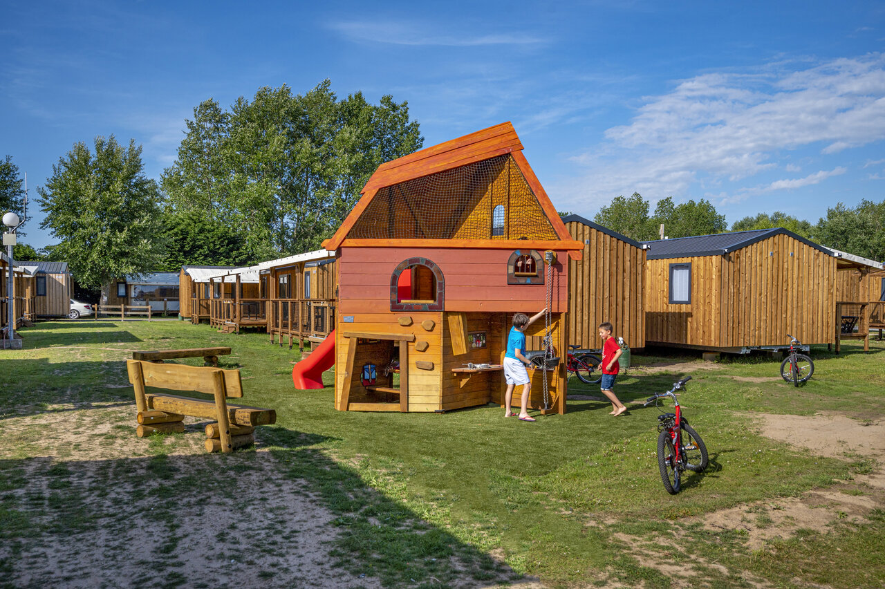 Playground, Mobile homes at CAPFUN La Route Blanche in Breville sur Mer (50).