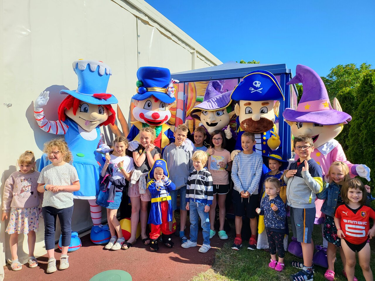 Children and mascots at CAPFUN La Route Blanche campsite in Breville sur Mer.