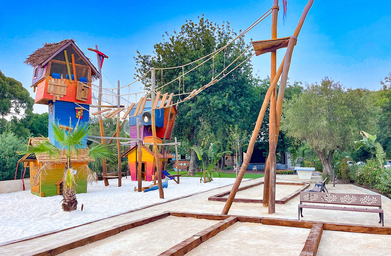 Colorful playground and p�tanque courts at CAPFUN La Rumba campsite in Fr�jus (83).