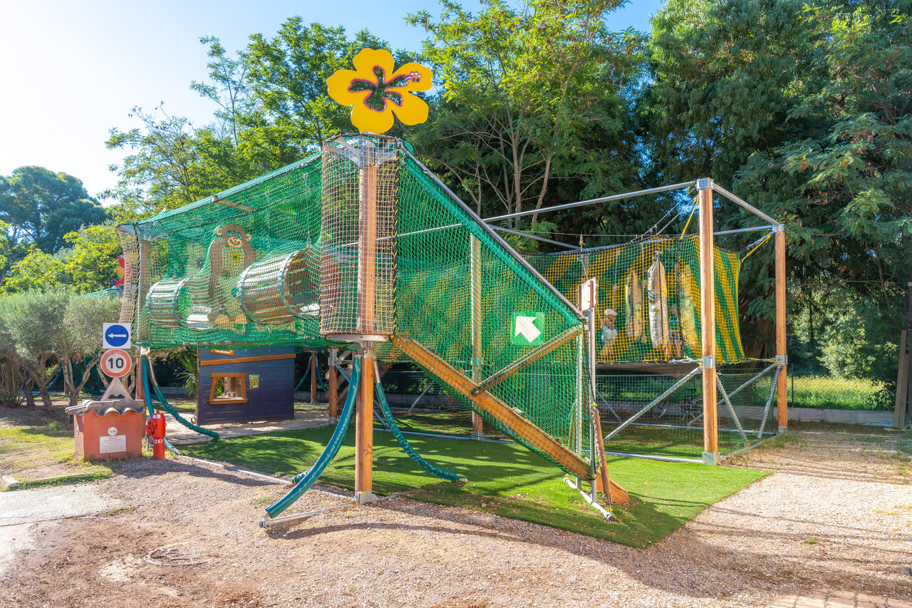 Giant play structure with nets and tunnels at CAPFUN La Rumba campsite in Fr�jus (83).