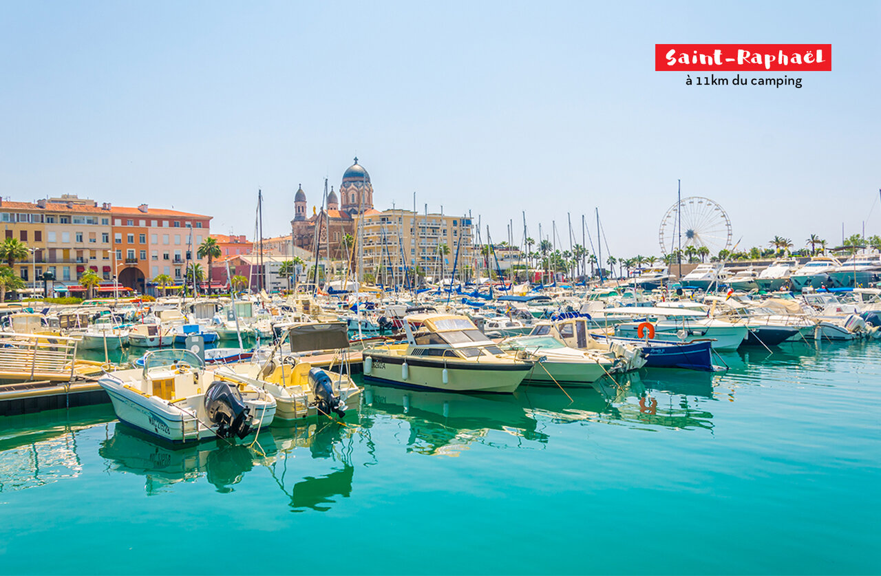 Saint-Rapha�l marina with boats and Ferris wheel, French Riviera.