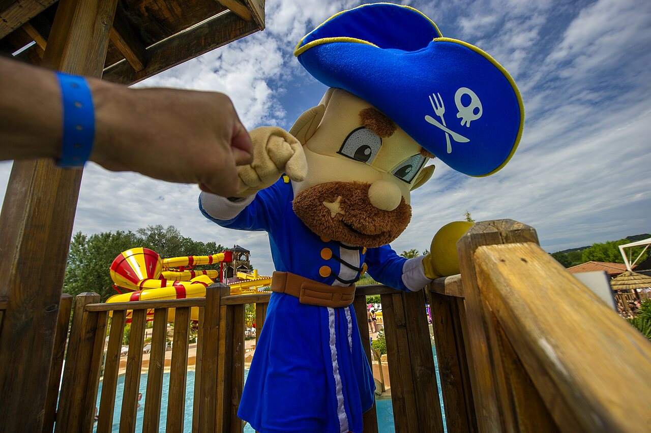 Pirate mascot and water slides at CAPFUN Sagittaire campsite in VINSOBRES (26).
