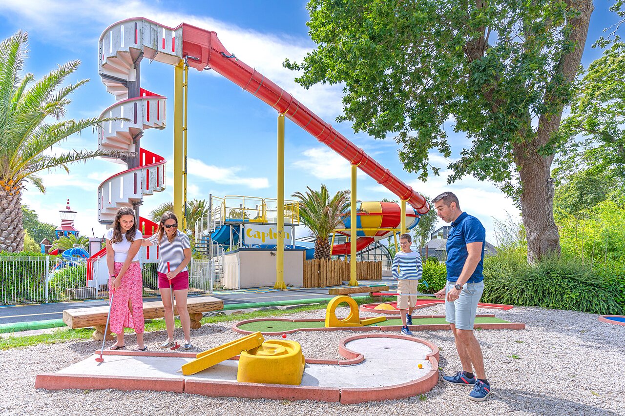 Family mini-golf, water slide at CAPFUN Saint Laurent campsite in LA FORET FOUESNANT.