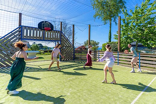 Multi-sport court and basketball at CAPFUN Saint Laurent campsite in LA FORET FOUESNANT.