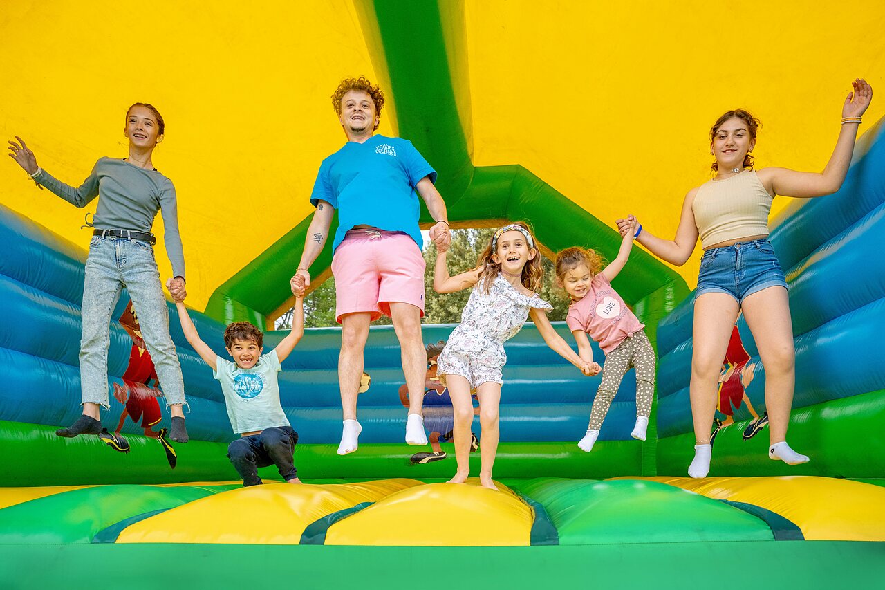 Inflatable game, children, VAGUES OCEANES Soleil de Provence campsite in Saint-Romain-en-Viennois.