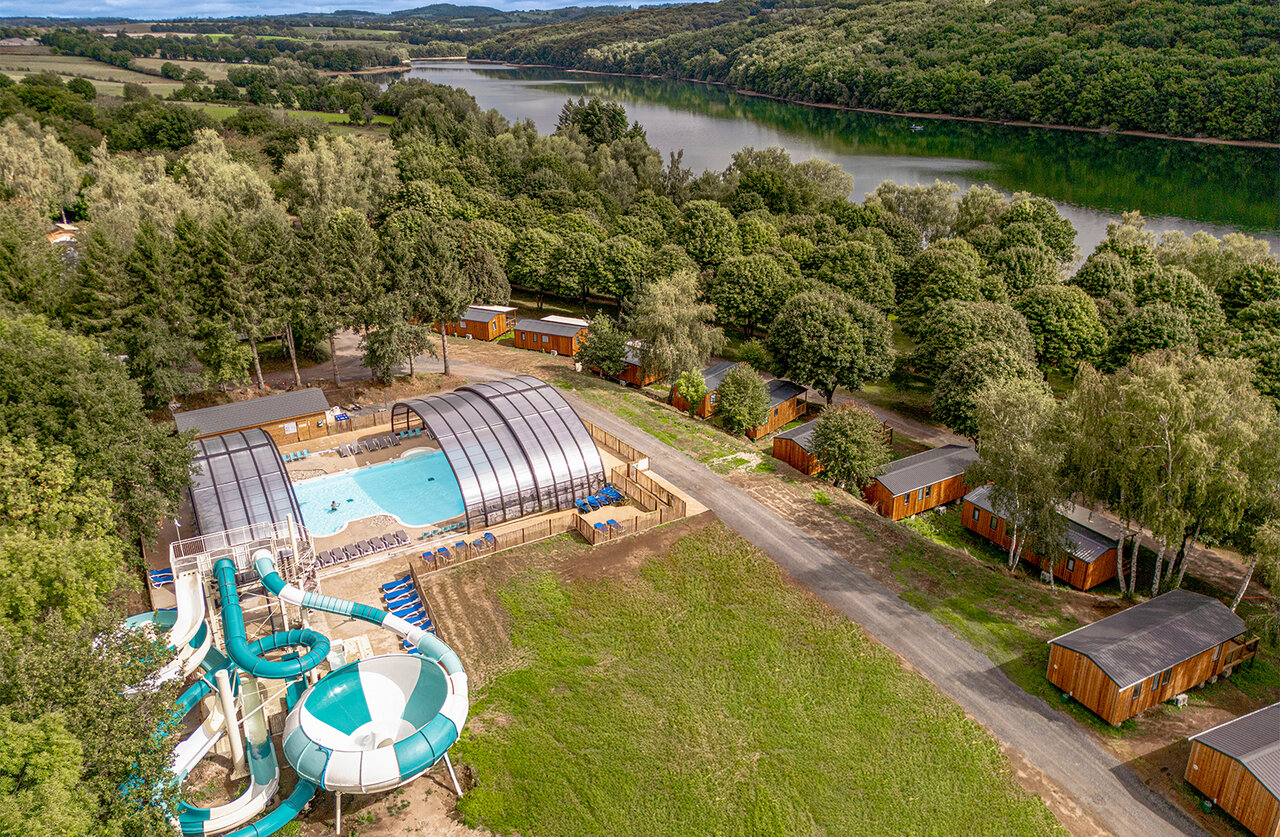Water park, slides and Mobile homes at CLICOCHIC Soleil Levant campsite in Canet-de-Salars (12).