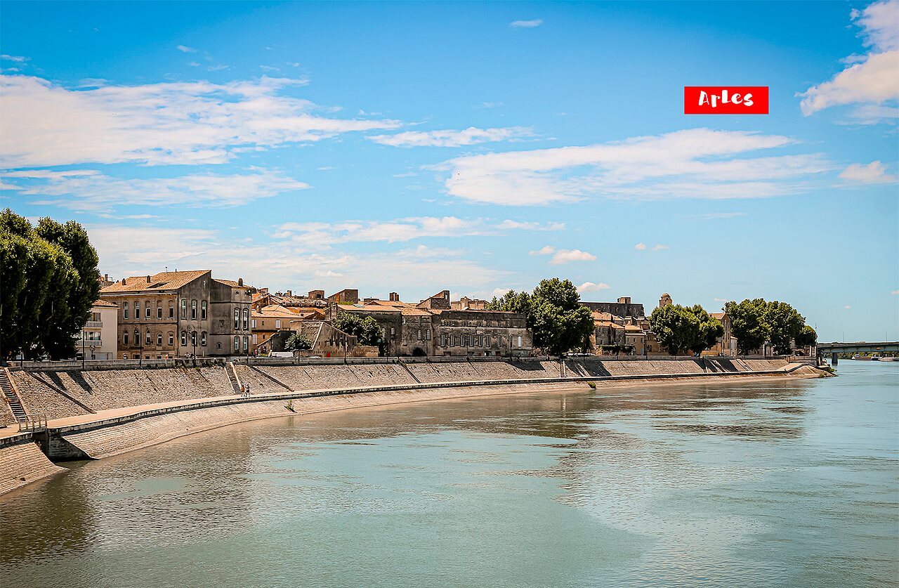 Rh�ne riverbanks and historic architecture of Arles, a city to visit in Provence.