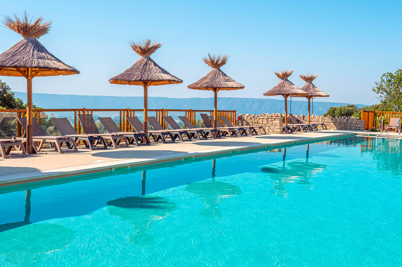 Pool, loungers, parasols at CLICOCHIC Les Sources de Gordes, GORDES (84).