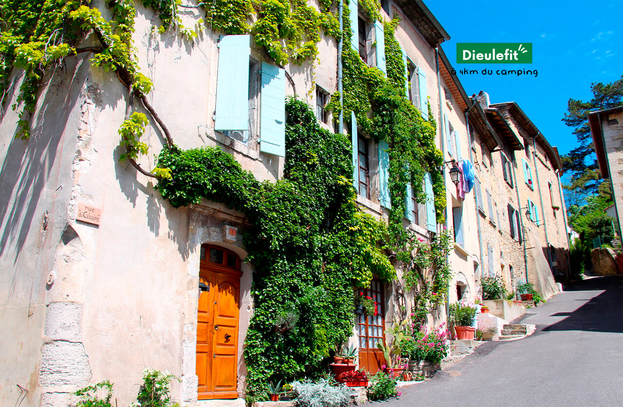 Picturesque street and flowery houses in Dieulefit, charming town in Dr�me Proven�ale.