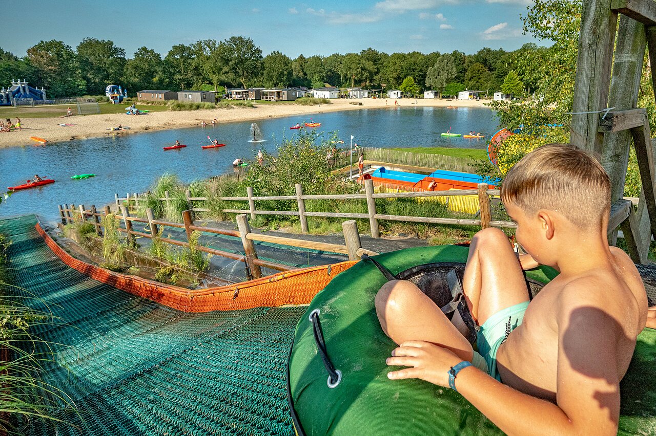 Water slide, lake at CAPFUN Vakantiepark Capfun het Stoetenslagh in Rheezerveen.