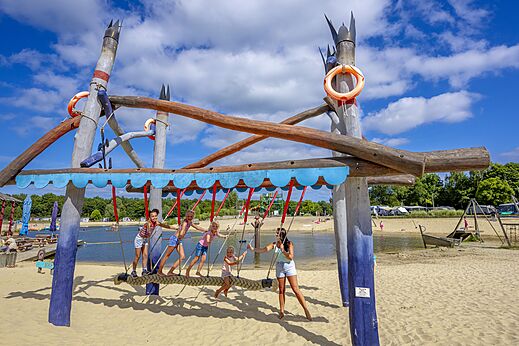 Playground, beach at CAPFUN Vakantiepark Capfun het Stoetenslagh campsite in Rheezerveen.