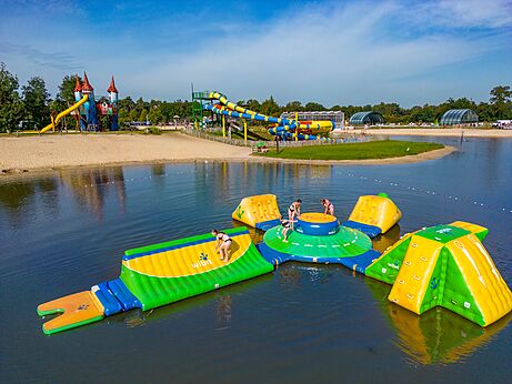 Inflatable water park and giant slides at CAPFUN Vakantiepark Capfun het Stoetenslagh.