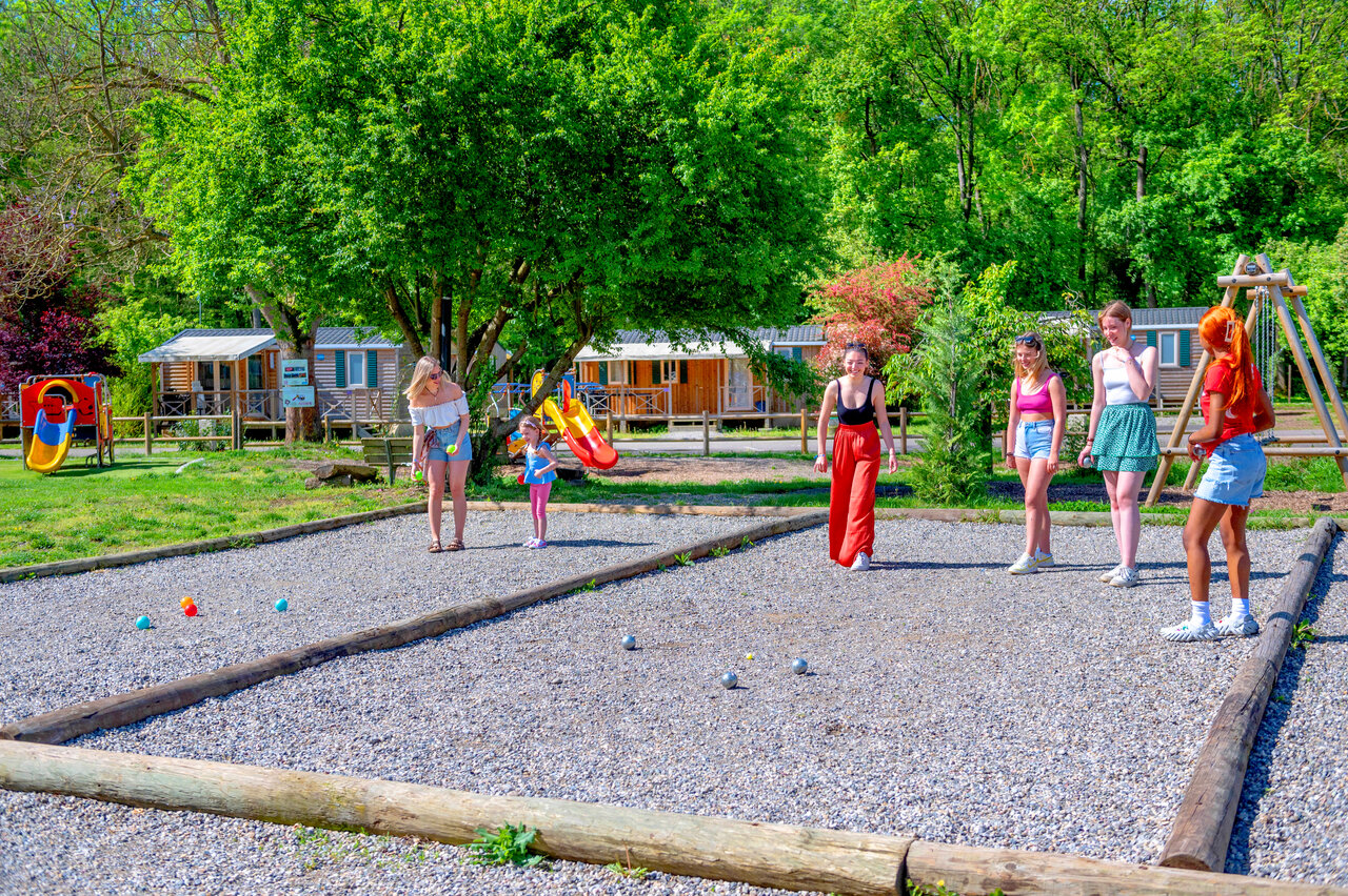 Petanque court, Mobile homes and playground at CAPFUN Suzel campsite, Sainte-Croix.