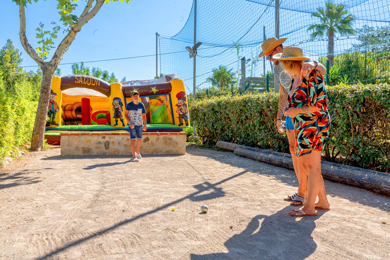 Petanque, bouncy castle at CLICOCHIC Texas campsite in Argel�s sur Mer.