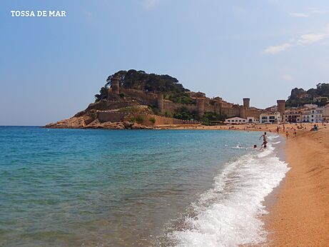 Tossa de Mar beach with its medieval castle and the Mediterranean Sea.