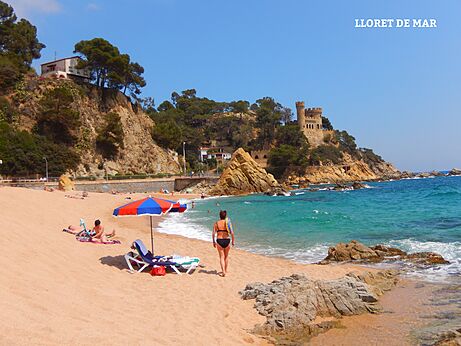 Lloret de Mar beach with its medieval castle, Costa Brava, Spain.