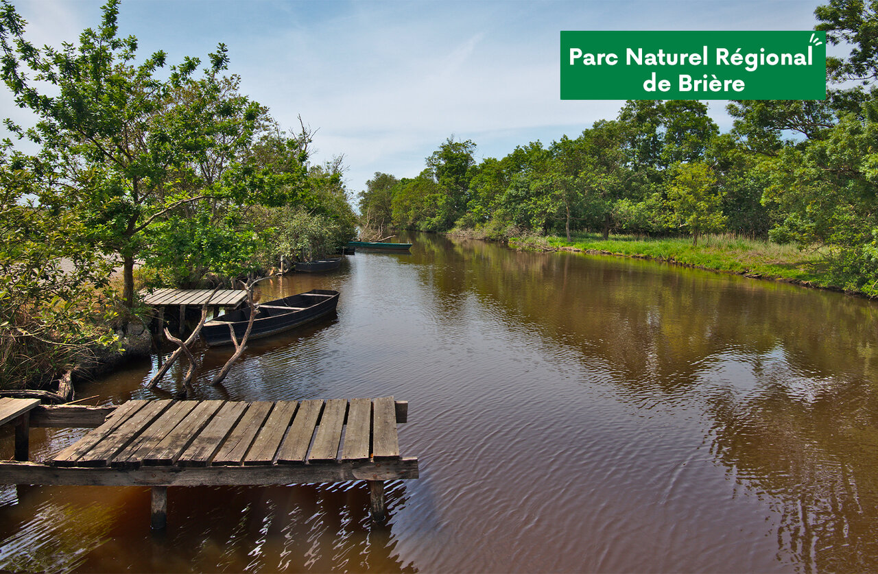 Canal and traditional boats in the Bri�re Regional Natural Park, worth visiting.