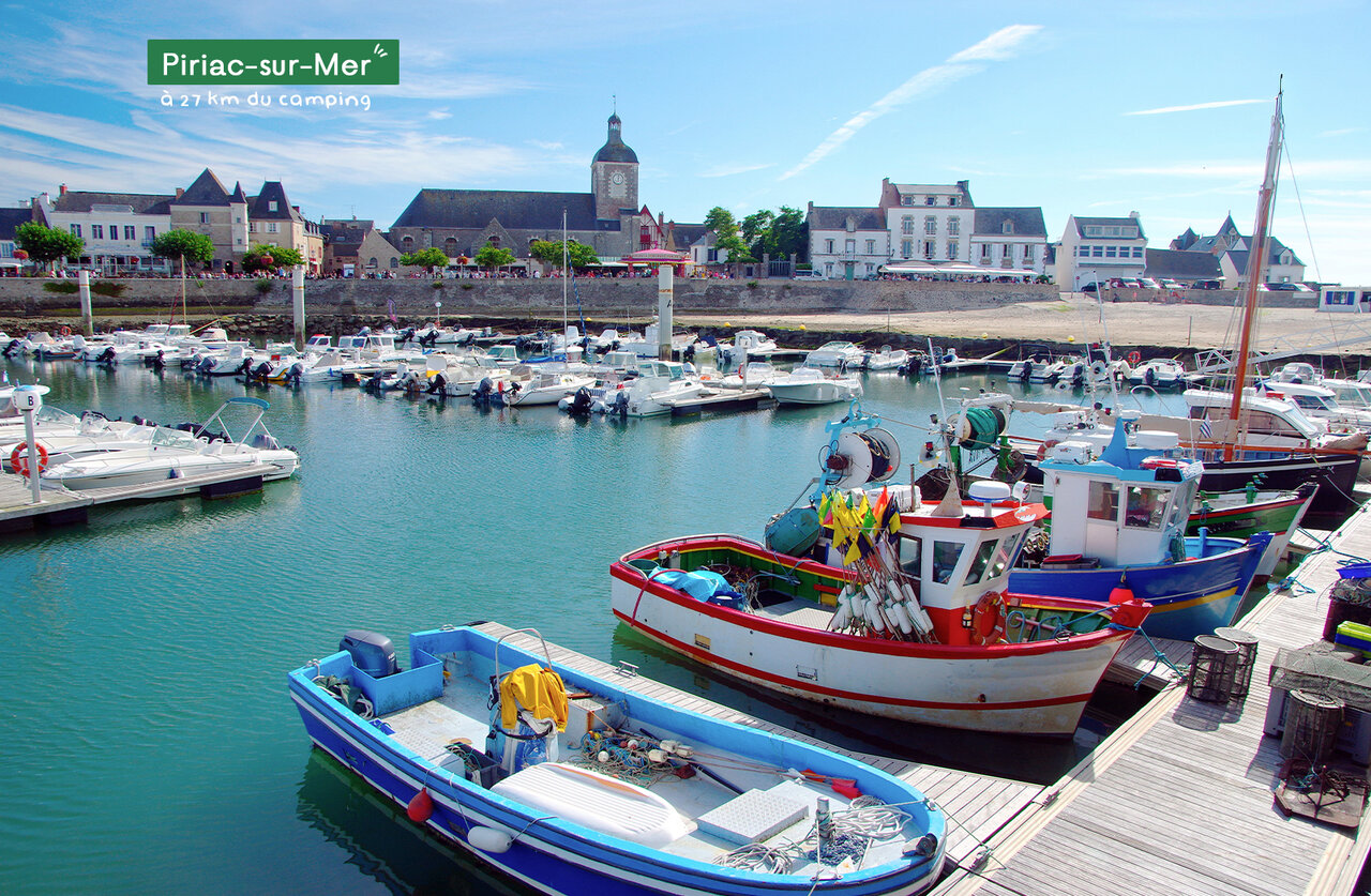Piriac-sur-Mer harbor, Loire-Atlantique, with boats and historic village.