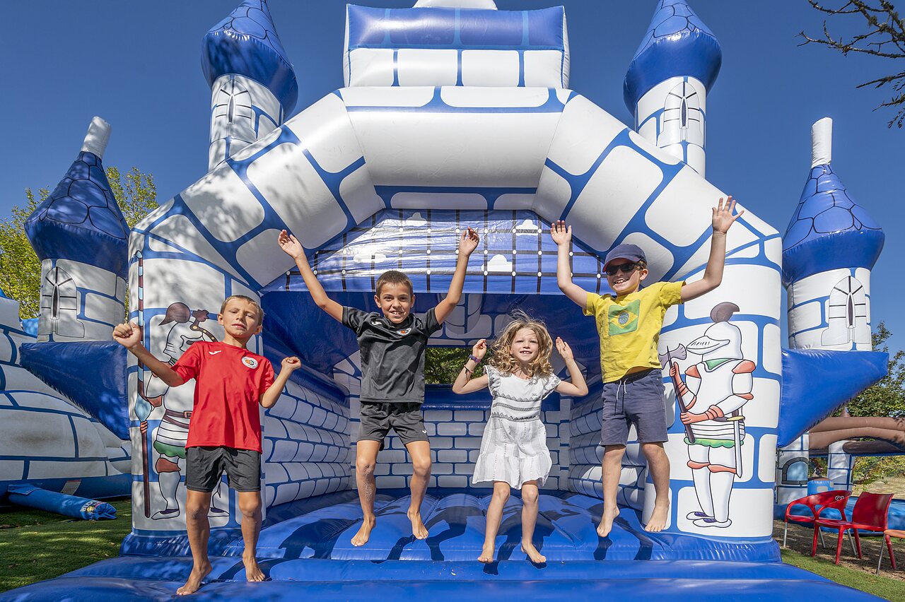 Inflatable castle for children at CAPFUN Ullule campsite in Tournon d'Agenais (47).