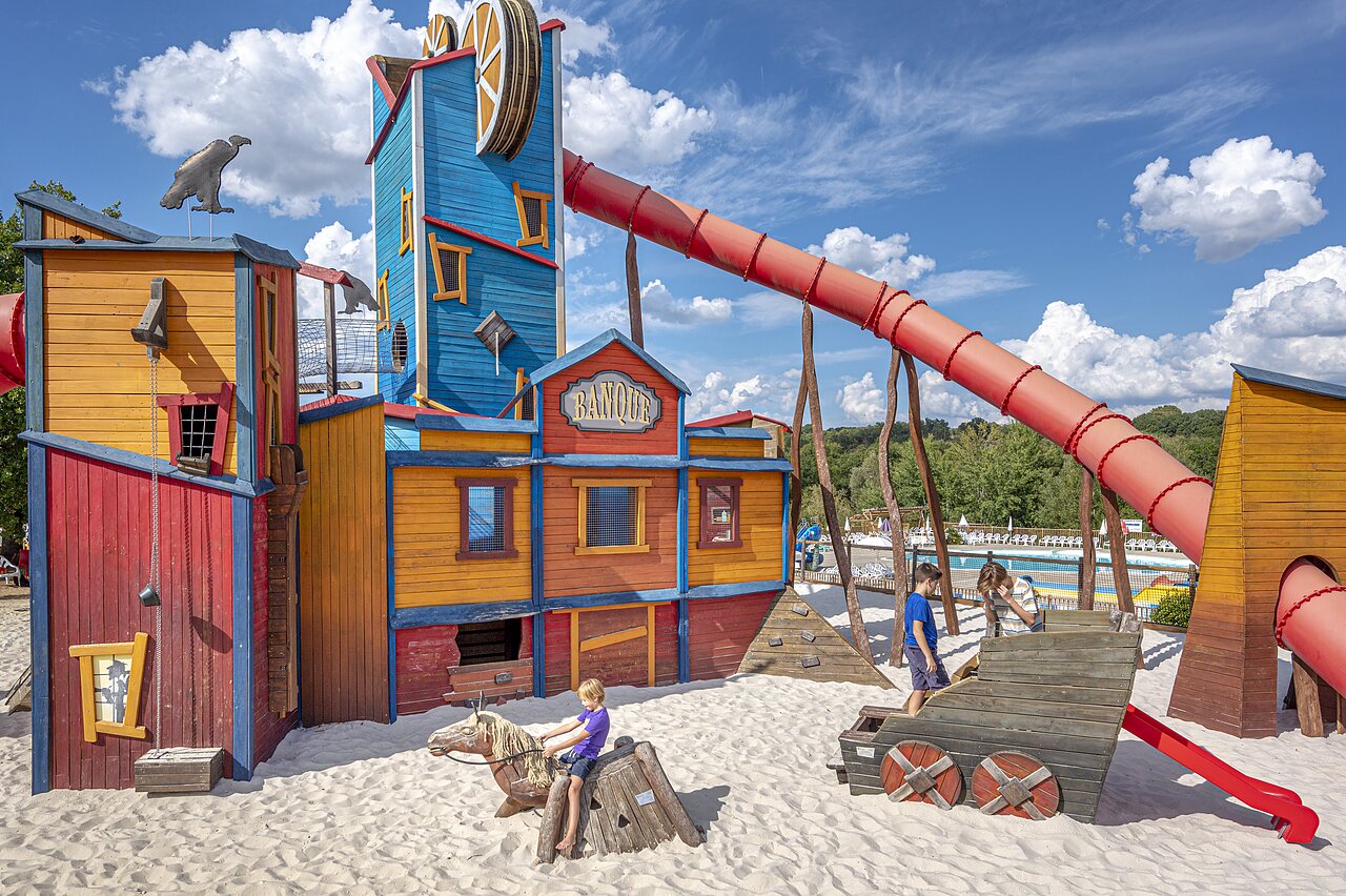 Themed playground, slide and children at CAPFUN Ullule campsite Tournon d'Agenais (47).