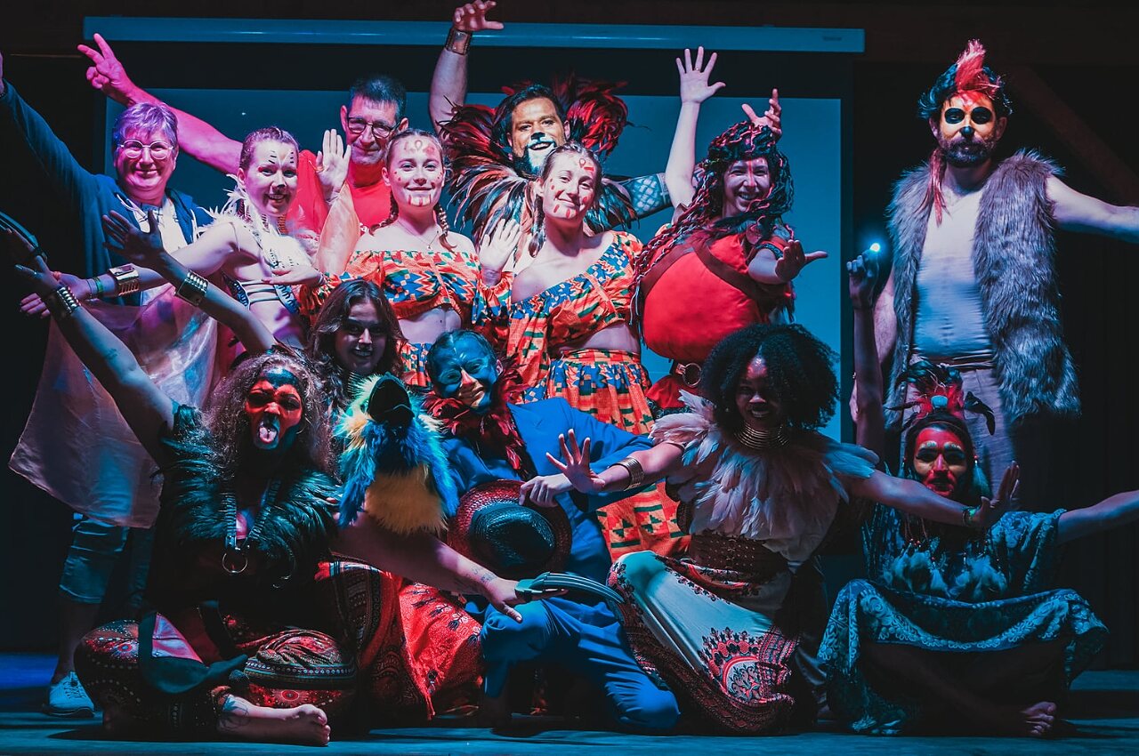 Group of costumed and made-up entertainers on stage at CAPFUN Ullule campsite in Tournon d'Agenais (47).