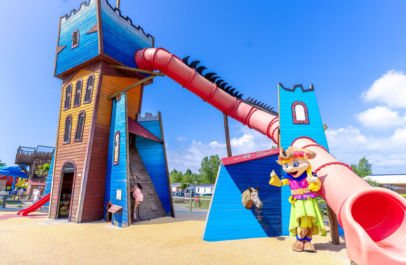 Carabouille playground - Castle play structure, slide and mascot at CAPFUN Vikings campsite.