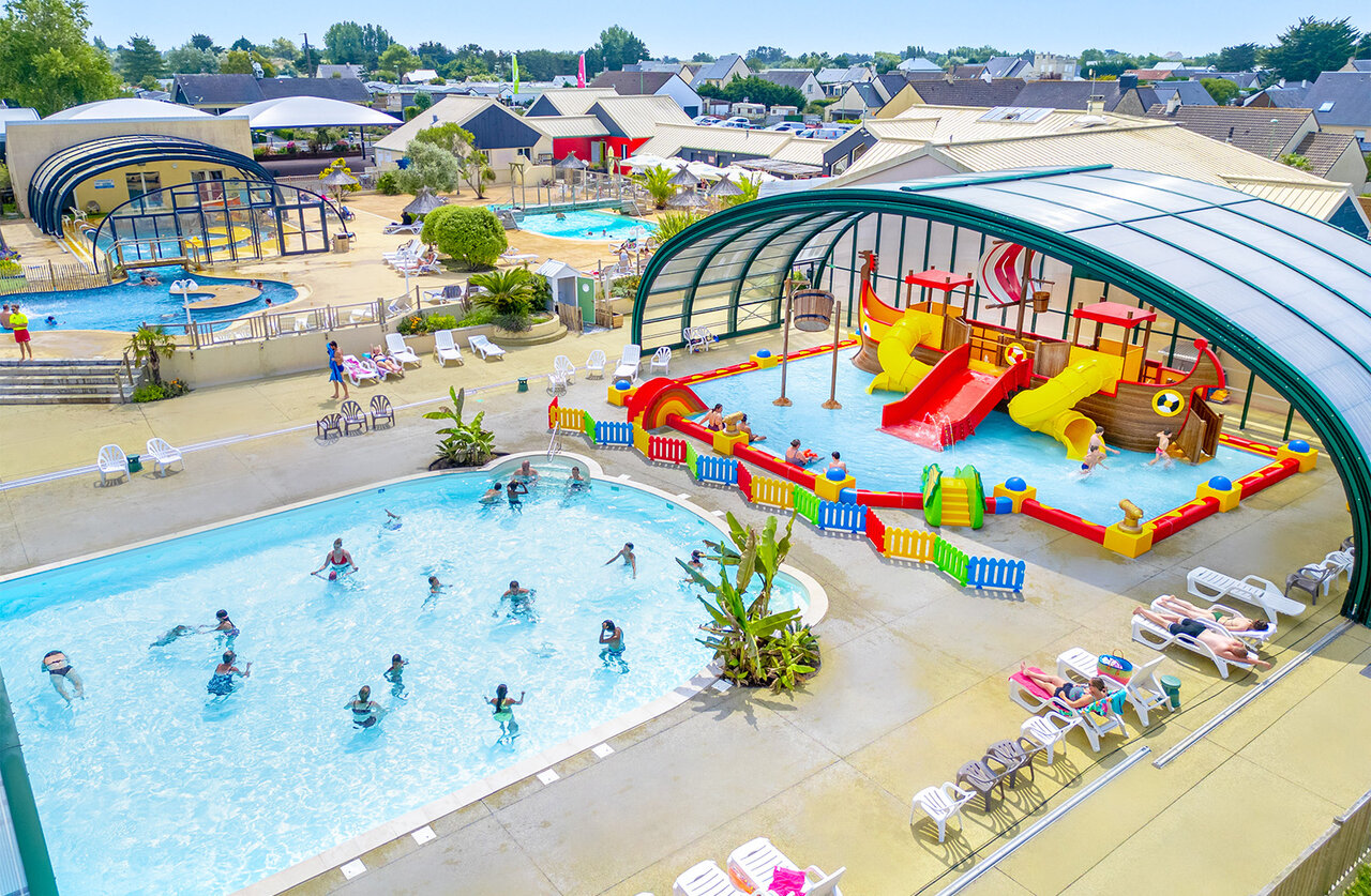 Outdoor and indoor pools, slides and water games at CAPFUN Vikings campsite in Saint Jean de la Rivi�re (50).