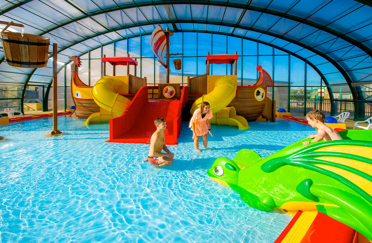 Indoor pool, water games, slides at CAPFUN Vikings campsite in Saint Jean de la Rivi�re.