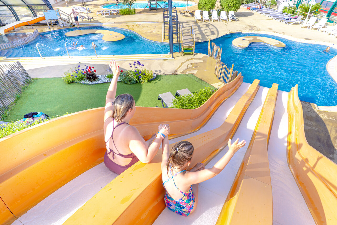 Large water slide and outdoor pools at CAPFUN Vikings campsite in Saint Jean de la Rivi�re (50).