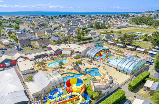 Aerial view of the water park with pools and slides at CAPFUN Vikings campsite in Saint Jean de la Rivi�re (50).